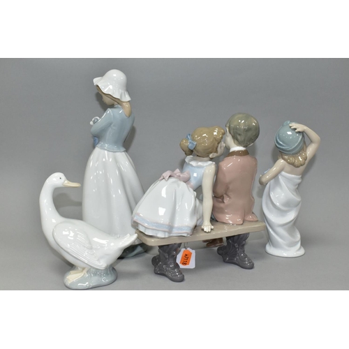 524 - TWO LLADRO FIGURES AND TWO NAO FIGURES, comprising 'Ten and Growing' No 7635, depicting girl kissing... 