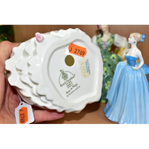 525 - TWO ROYAL DOULTON LADIES AND A COALPORT LADY, comprising 'Dawn' HN3600, glued repair to wrist of rai... 