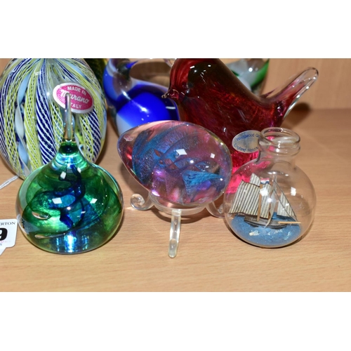 529 - NINE SECOND HALF 20TH CENTURY GLASS PAPERWEIGHTS AND A DUTCH MINIATURE SHIP IN A BAUBLE, height 5.5c... 