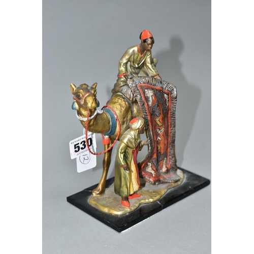 530 - A COLD PAINTED SPELTER TABLE LIGHTER IN THE FORM OF TWO FIGURES WITH A CAMEL, in the style of Bergma... 