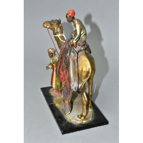 530 - A COLD PAINTED SPELTER TABLE LIGHTER IN THE FORM OF TWO FIGURES WITH A CAMEL, in the style of Bergma... 