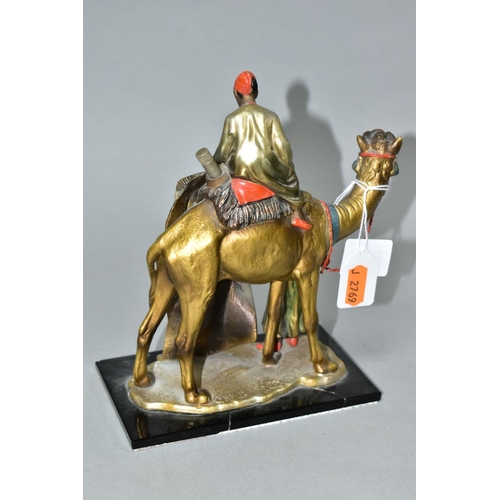 530 - A COLD PAINTED SPELTER TABLE LIGHTER IN THE FORM OF TWO FIGURES WITH A CAMEL, in the style of Bergma... 