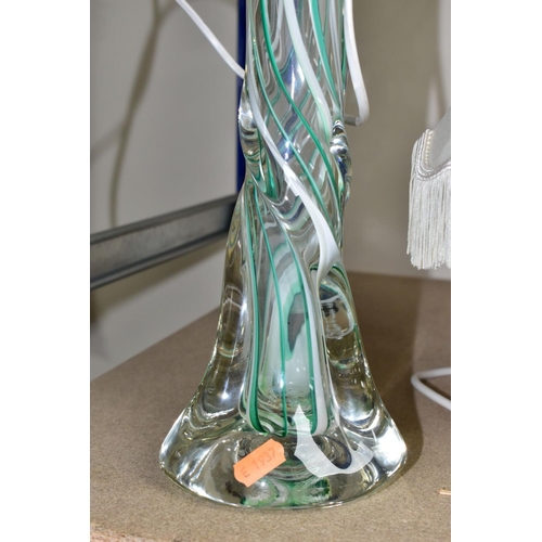 561 - TWO GLASS BASED TABLE LAMPS, comprising a Strathearn  lamp with cased green and white spiral, impres... 