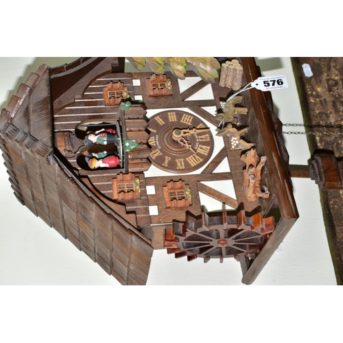 576 - A LATE 20TH CENTURY SCHNEIDER MUSICAL CUCKOO CLOCK, approximate height 35cm, in need of some attenti... 