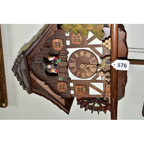 576 - A LATE 20TH CENTURY SCHNEIDER MUSICAL CUCKOO CLOCK, approximate height 35cm, in need of some attenti... 