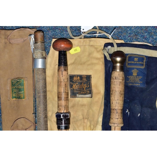 579 - THREE VINTAGE FISHING RODS, comprising a Hardy Graphlite Salmon De-luxe, nine weight 13ft 9inches 42... 