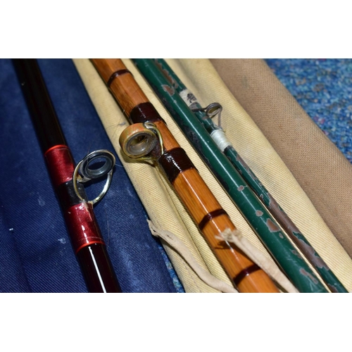 579 - THREE VINTAGE FISHING RODS, comprising a Hardy Graphlite Salmon De-luxe, nine weight 13ft 9inches 42... 