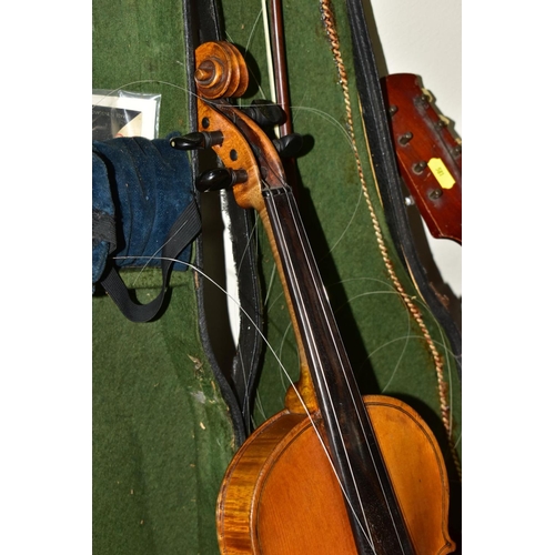 581 - THREE STRINGED INSTRUMENTS, comprising two unbranded banjolins, approximate lengths 58cm and 54cm an... 