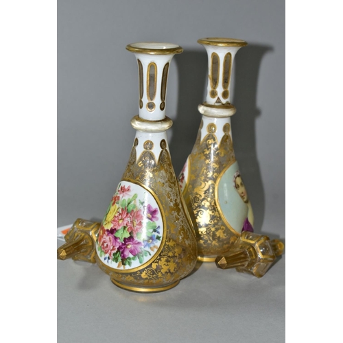 587 - A PAIR OF BOHEMIAN GLASS OVERLAY BOTTLES WITH STOPPERS, hand painted female  portraits to one side, ... 