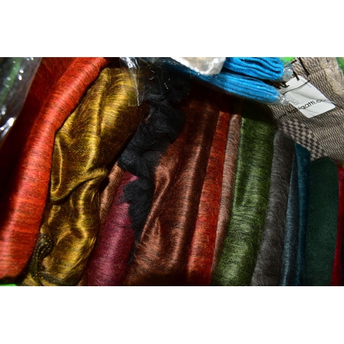 613 - TWO BOXES OF AS NEW LADIES SCARVES, to include approximately forty autumn/winter scarves in varied c... 