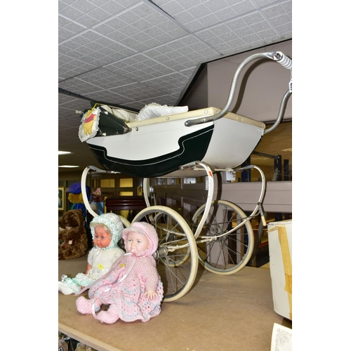 655 - A CHILDS SILVER CROSS PRAM, the body has been repainted, together with a Palitoy plastic doll with s... 