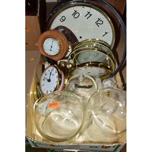 674 - TWO BOXES OF CLOCKS AND CLOCK PARTS, including two mid-20th century cuckoo clocks, the smaller one f... 