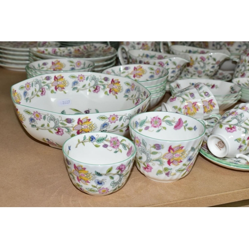 693 - A ONE HUNDRED AND EIGHTY SEVEN PIECE MINTON HADDON HALL DINNER SERVICE, comprising fifteen dinner pl... 