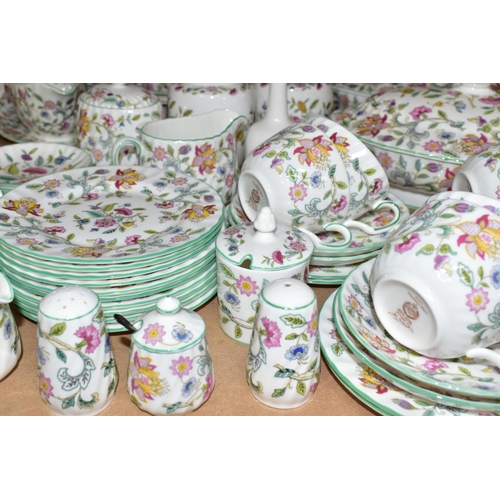 693 - A ONE HUNDRED AND EIGHTY SEVEN PIECE MINTON HADDON HALL DINNER SERVICE, comprising fifteen dinner pl... 