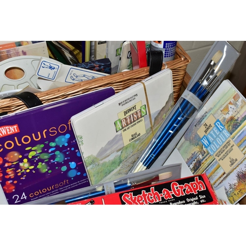 702 - A HAMPER OF ART SUPPLIES, to include a small lightweight wooden easel, tins of Derwent watercolour a... 