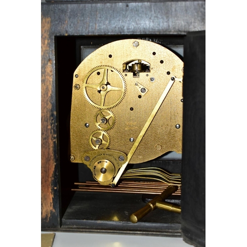 703 - FOUR CLOCKS, comprising an art nouveau style brass cased Ansonia mantel clock, the enamel dial set w... 