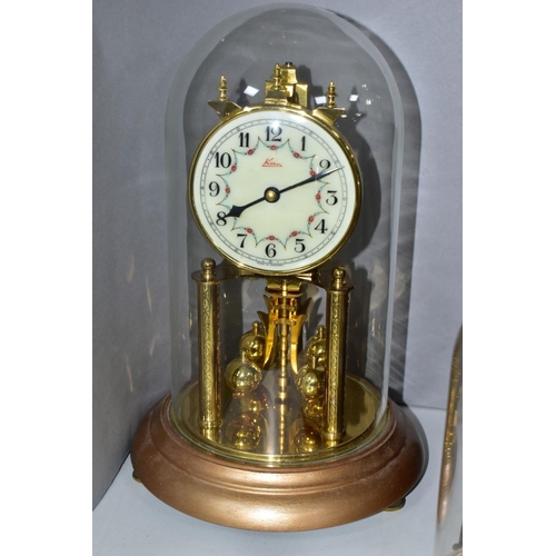 703 - FOUR CLOCKS, comprising an art nouveau style brass cased Ansonia mantel clock, the enamel dial set w... 