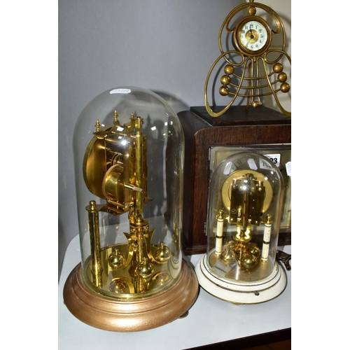 703 - FOUR CLOCKS, comprising an art nouveau style brass cased Ansonia mantel clock, the enamel dial set w... 