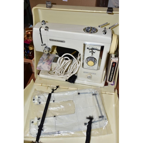 704 - TWO BOXES AND LOOSE a cased Frister Rossman model 503 sewing machine, four late twentieth century la... 