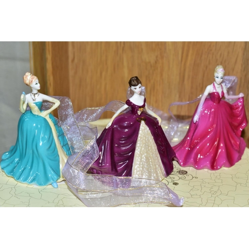 720 - A BOXED SET OF THREE COALPORT MINIATURE LADIES, comprising 'Belle of the Ball', 'Shall we Dance' and... 