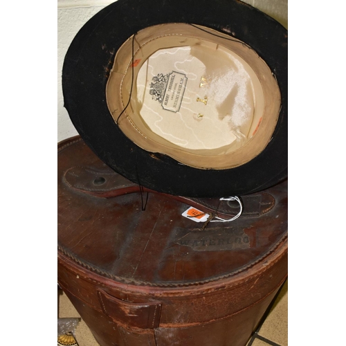 725 - A SMALL DISTRESSED TOP HAT AND LEATHER CASE, together with a small box of reclaimed tiles including ... 