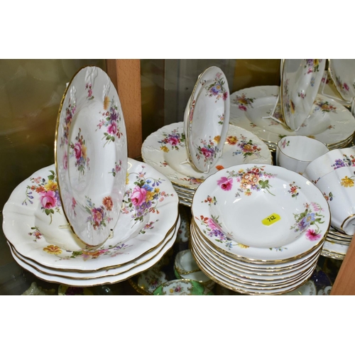 762 - A SIXTY EIGHT PIECE ROYAL CROWN DERBY DERBY POSIES DINNER SERVICE with various red and green backsta... 