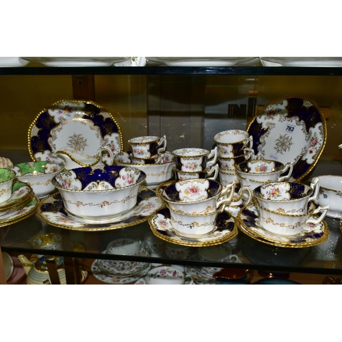 763 - A COALPORT BLUE BAT WING PART TEA SET, with a smaller green batwing part tea set, the twenty eight p... 