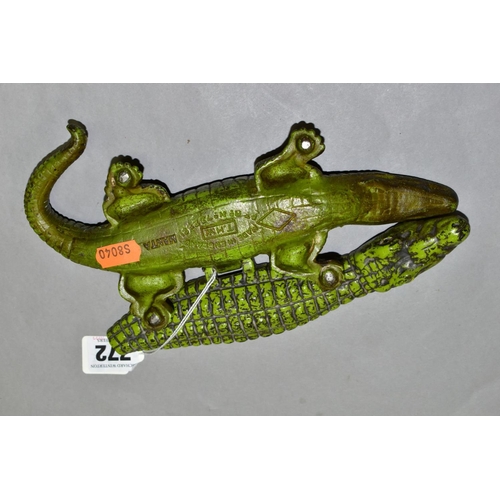 772 - A VINTAGE CAST IRON CIGARETTE/VESTA CASE, in the form of a crocodile, with hinged lid revealing inte... 