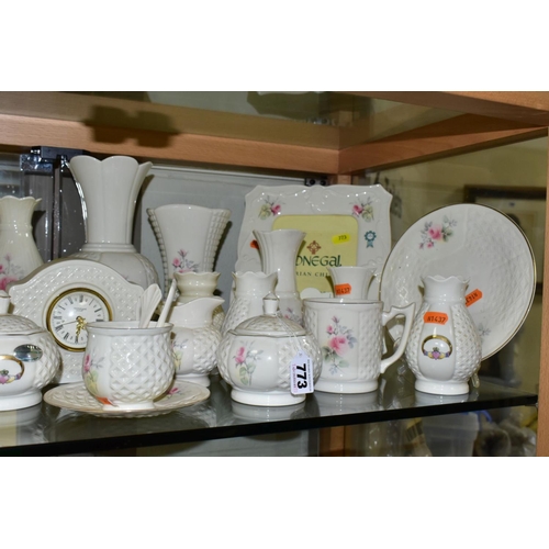 773 - A COLLECTION OF DONEGAL AND BELLEEK CHINA, approximately thirty pieces to include a Belleek trinket ... 