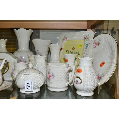 773 - A COLLECTION OF DONEGAL AND BELLEEK CHINA, approximately thirty pieces to include a Belleek trinket ... 