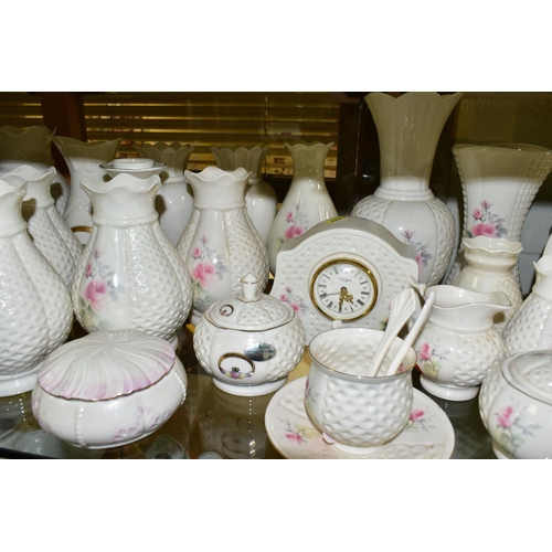 773 - A COLLECTION OF DONEGAL AND BELLEEK CHINA, approximately thirty pieces to include a Belleek trinket ... 