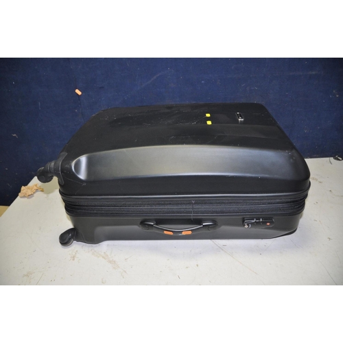 1251 - TWO LINEA HARDSHEL SUITCASES  the biggest height 72cm and width 54cm and a Philips FCD285 with match... 