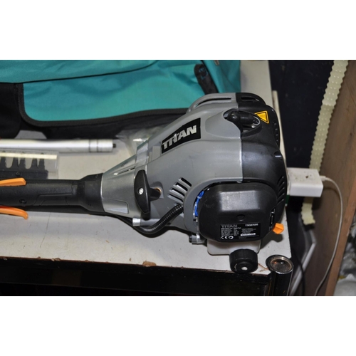 1288 - A TITAN TTK587GDO FOUR IN ONE PETROL GARDEN TOOL with chain saw, hedge trimmer, strimmer, three exte... 