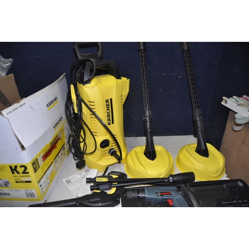 1350 - A KARCHER K2 PRESSURE WASHER with two patio heads, a Karcher Window Vac, a Performance Power 12v Cor... 