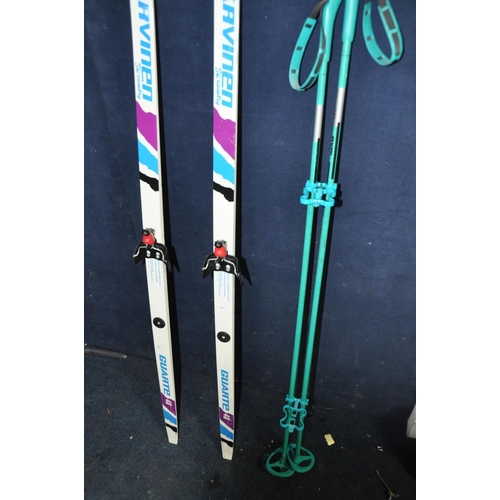 1371 - A PAIR OF J'A'RVINEN GUARTE 48 SKI'S along with a pair of Nova exel ski poles (4)