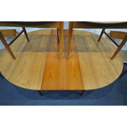 1402 - A MID CENTURY TEAK CIRCULAR EXTENDING DINING TABLE, with a single fold out leaf, extended leaf 150cm... 