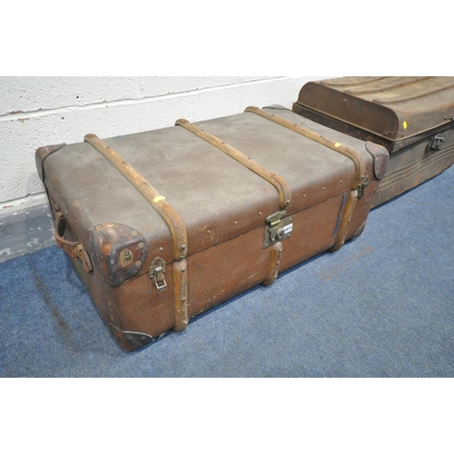 1411 - A VINTAGE TIN TRAVELING TRUNK (dent to top and locking mechanism handing off) and a canvass and wood... 