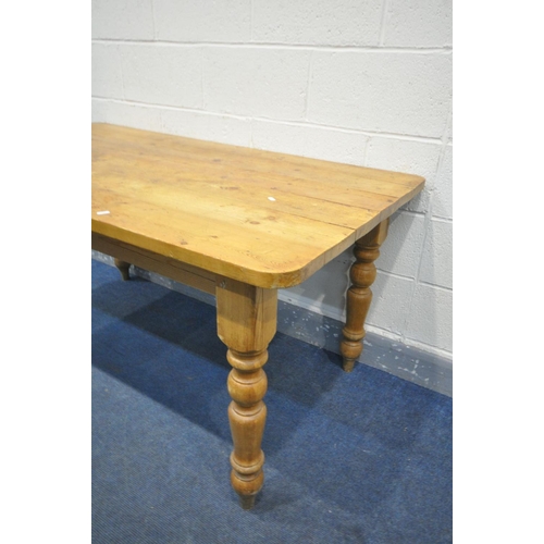 1414 - A 20TH CENTURY PINE RECTANGULAR KITCHEN TABLE, on block and turned legs length 153cm x depth 83cm x ... 