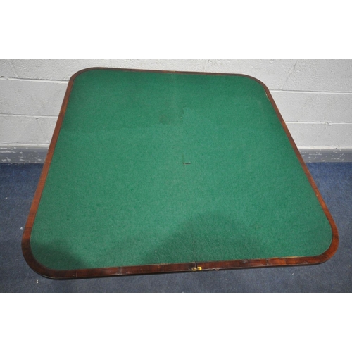 1418 - AN EARLY 20TH CENTURY MAHOGANY FOLD OVER CARD TABLE, with green baize lining, internal storage, on c... 