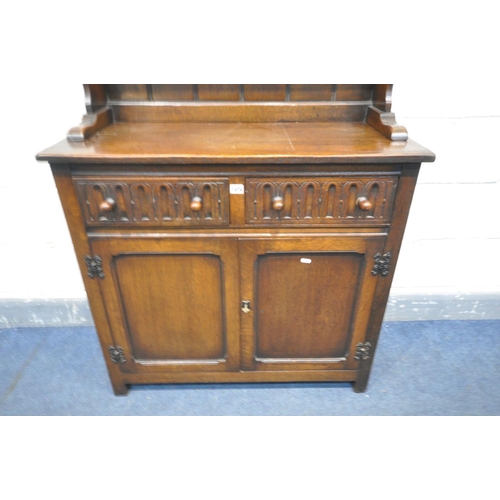 1424 - A SLIM REPRODUCTION OAK DRESSER, with two drawers, width 92cm x depth 40cm x height 175cm x height o... 