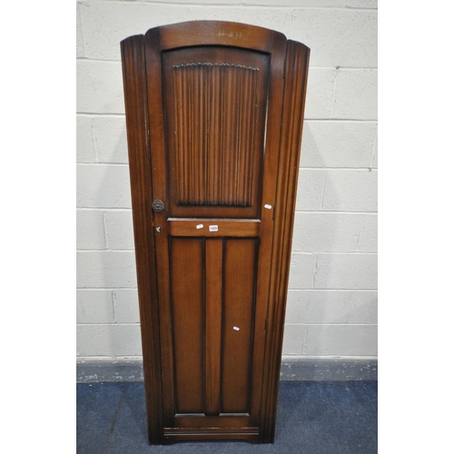 1425 - A SLIM OAK HALL CUPBOARD, width 61cm x depth 40cm x height 181cm (key) (condition:-surface scratches... 