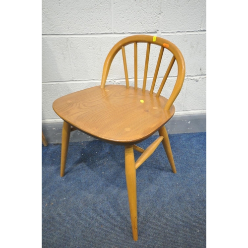 1431 - AN ERCOL MID CENTURY ELM AND BEECH MODEL 439 WRITING DESK, with two small drawers to top and a longe... 