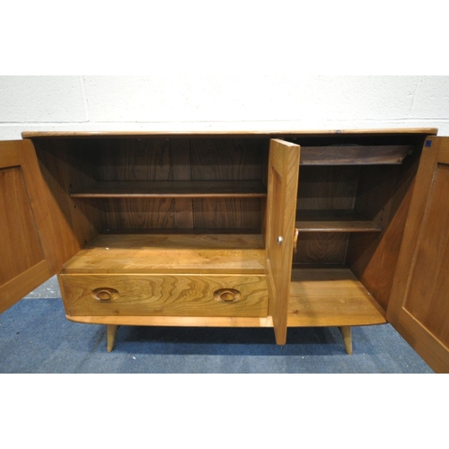 1433 - AN ERCOL MODEL 467 ELM AND BEECH SIDEBOARD, with double cupboard door above a single drawer, besides... 