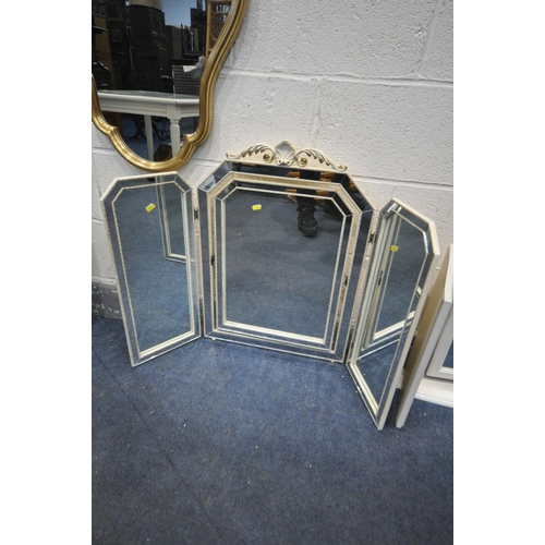 1438 - AN ATTEWELL GILTWOOD BEVELLED EDGE RECTANGULAR WALL MIRROR, with foliate border, ebonised trim and s... 