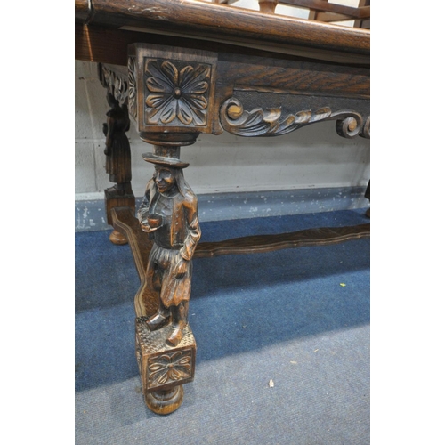 1452 - A FRENCH OAK DRAW LEAF BRETON TABLE, on four carved standing people, united by stretchers, extended ... 