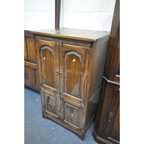 1462 - AN OAK LINENFOLD CORNER CUPBOARD, width 72cm x depth 39cm x height 176cm (key) a reproduction oak ha... 