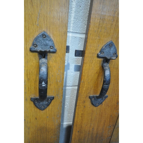 1469 - TWO SIZED OAK SLATTED INTERIOR COTTAGE DOOR, with iron handles and hinges, 75.5cm x 194cm & 59.5cm x... 