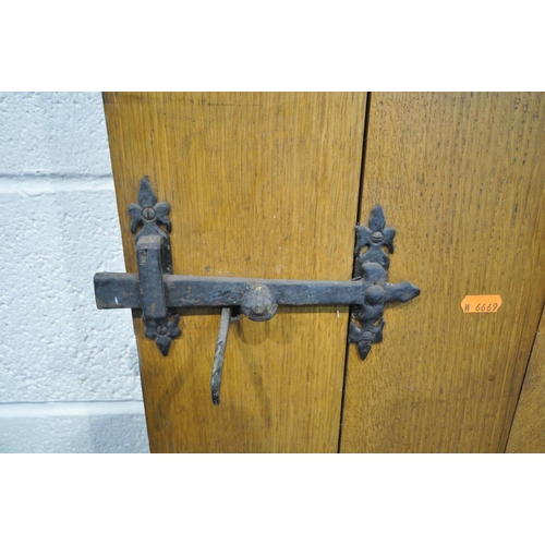 1469 - TWO SIZED OAK SLATTED INTERIOR COTTAGE DOOR, with iron handles and hinges, 75.5cm x 194cm & 59.5cm x... 