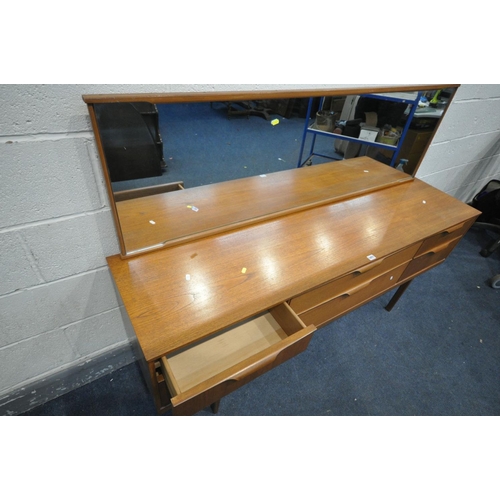 1471 - A MID CENTURY AUSTINSUITE TEAK DRESSING TABLE DRESSING TABLE, with a rectangular mirror, and six dra... 