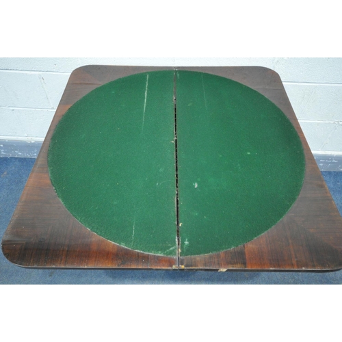 1476 - A GEORGE IIII ROSEWOOD FOLD OVER CARD TABLE, with green baize playing surface, supported by a flared... 